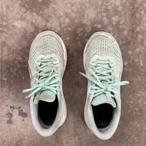 Well worn women’s ASICS sneakers size 9